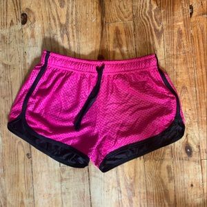 Pink and black sports shorts